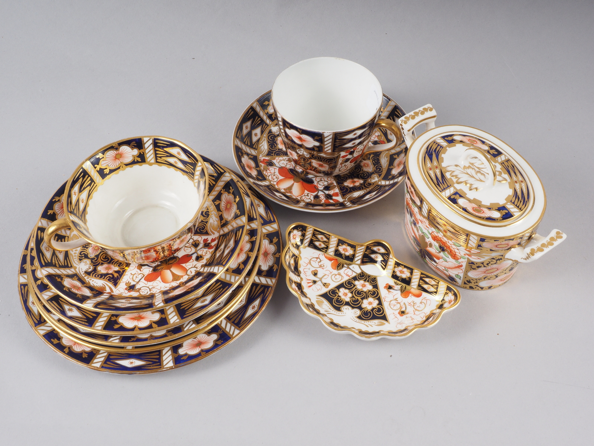 A pair of Royal Crown Derby cups, pattern 2451, six matching saucers, a similar pin dish and a - Image 2 of 2