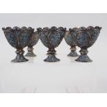 A set of six Oriental white metal filigree egg cups with enamel decoration, 4.2oz troy approx