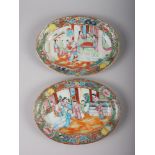 A pair of Cantonese porcelain dishes, centres decorated figures, 11" x 8"