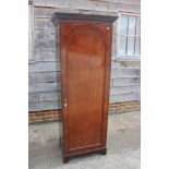 A figured mahogany 'sentry box' hall wardrobe enclosed arched top panel door, on bracket feet, 27"