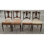 Two pairs of late Victorian rosewood and inlaid salon chairs, and a similar chair, on turned and