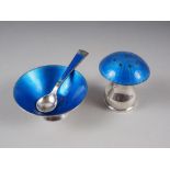 A Danish silver and blue enamel salt with spoon and matching mushroom shaped pepperette