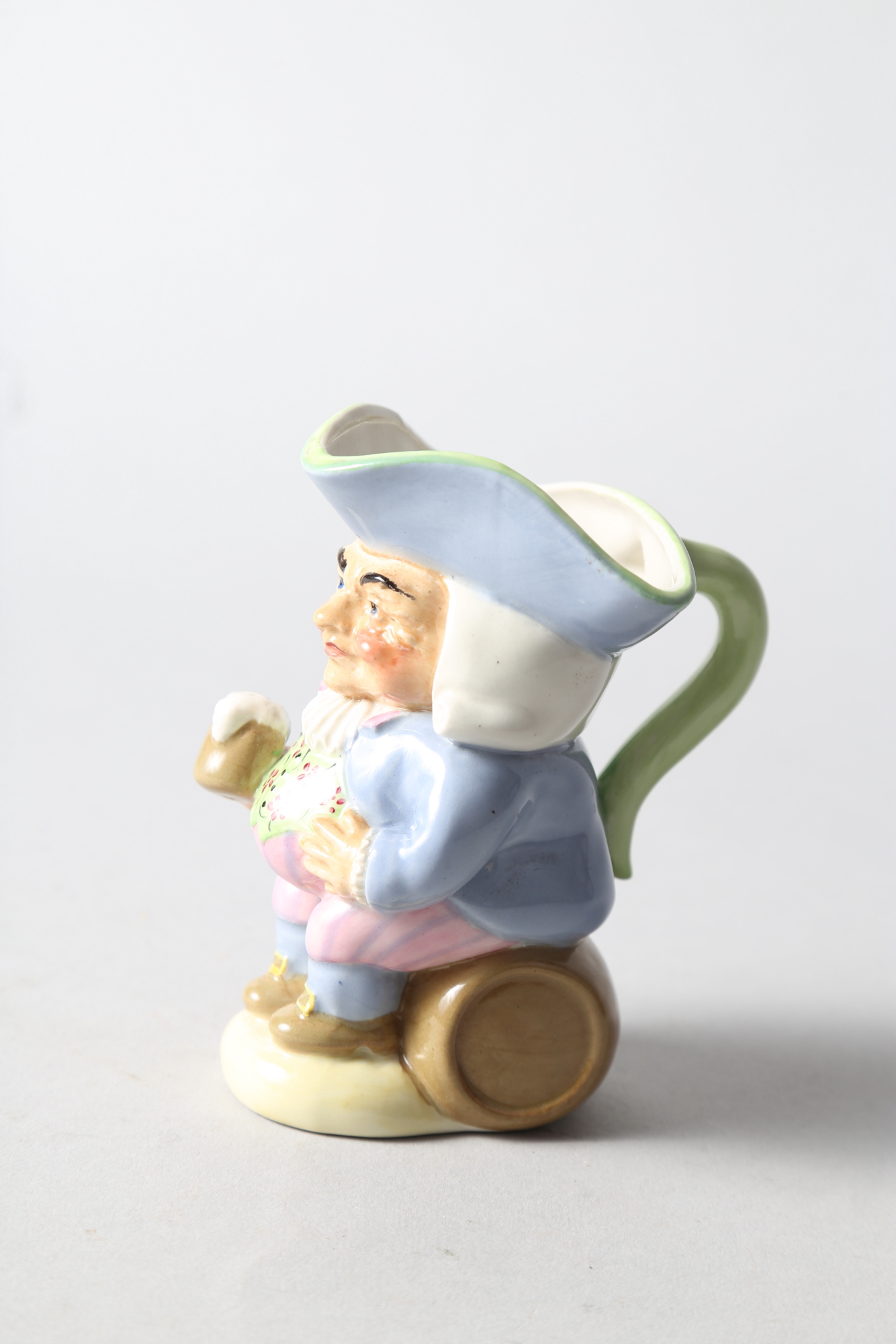 A Sylfan Davies hand-painted Toby jug, 4 1/2" high