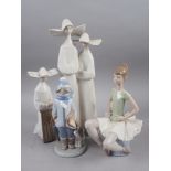 Two Lladro nun figures, taller 13" high, and two similar figures of a seated ballerina and a boy