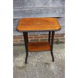 An Edwardian walnut and inlaid two-tier occasional table, on splay supports, 24" wide x 15" deep x