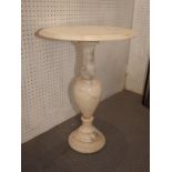 An alabaster occasional table and five alabaster table lamps