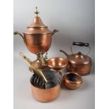 A copper samovar with brass tap, 18" high, a set of six graduated copper saucepans, etc
