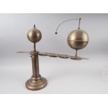 A patinated brass hand-operated sun, earth and moon orrery, 18" high