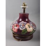 A Moorcroft "Pansy" table lamp, 8" high