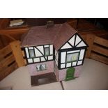 A 1940s painted doll's house, 24" high