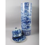 A Chinese blue and white cylindrical stick stand and a blue and white cheese dish