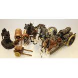 Five ceramic model horses with accessories, including tack and carriages, and a cold cast