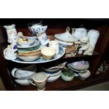 A quantity of ceramics, including three chamber pots, a meat platter, tureens, mugs, a model of an