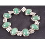A silver and jade cabochon bracelet