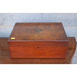 A burr walnut sewing box, containing sewing supplies, including a darning dolly, thread, needles