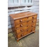 An 18th century oak chest of four long drawers with later knob handles, on bracket feet, 37" wide