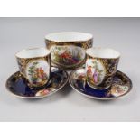 A pair of Vienna cabinet cups and saucers, decorated panels with figures in a landscape on a blue