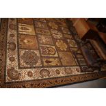 A Persian garden style carpet, in shades of blue, brown, fawn, green and natural, 144" x 108" approx