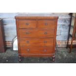 A 19th century mahogany chest of two short and three long graduated drawers with brass ring handles,