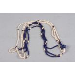 An Oriental lapis lazuli and pearl three-strand necklace