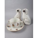 A pair of 19th century Staffordshire spaniels, 6 1/2" high, and a nursery cup and saucer