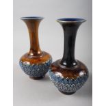 A pair of Doulton Burslem bulbous vases with relief decoration, 7 3/4" high