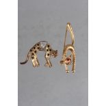 A yellow metal brooch, formed as a cat, set diamonds, sapphires and rubies, 4.7g, and another