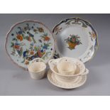 A Rouen faience plate with basket of flowers design, 10" dia, a similar plate with cornucopia and