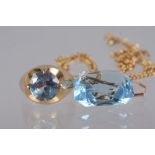 A 14ct gold and blue topaz ring, size K, 6g, and a similar pendant (as found), on 9ct gold flat curb