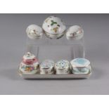 Three Wedgwood egg shaped trinket boxes, a rectangular Wedgwood pin tray and three other trinket