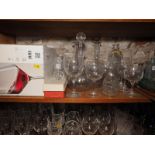 A quantity of pedestal glasses, including fourteen champagne flutes, twelve wines, two tumblers