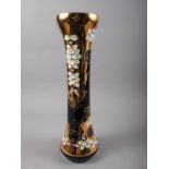 A Bohemian blue glass, gilt and high relief floral decorated vase, 16" high