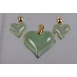 A pair of Lalique green glass heart-shaped earrings and a matching pendant