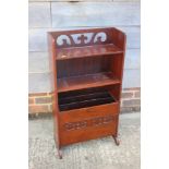 An early 20th century mahogany book/magazine stand, 18" wide x 7" deep x 34" high