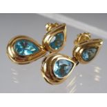 A pair of 18ct gold and pear-shaped topaz drop earrings, 10g gross