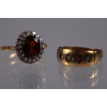 An 18ct gold, diamond and ruby cluster ring, size J, 3.8g, and a 9ct gold ruby and seed pearl