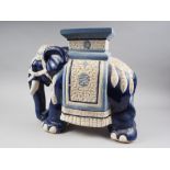 A blue glazed ceramic elephant stool, 17" high