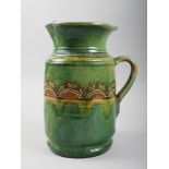 A Ubeda sgraffito and slip decorated jug, 9 1/2" high