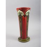 A Mintons Secessionist design slender tapering vase, decorated in red and green, 7 1/2" high