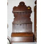 A George III pine spoon rack and candle box, 12" wide and a mahogany work box with fitted interior