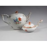 A Herend teapot, decorated floral sprays, 6 1/4" high, and a Herend pot with cover with handle