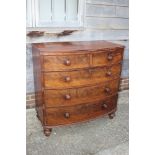 A 19th century figured mahogany bowfront chest of two short and three long graduated drawers with