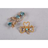 A 15ct gold, turquoise and seed pearl shamrock brooch, 3.1g, and a 9ct gold and blue zircon floral
