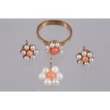 A suite of 9ct gold, coral and seed pearl jewellery, comprising ear studs, pendant and dress ring,