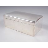 A rectangular silver cigarette box