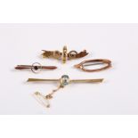 A 15ct gold and aqua bar brooch, 4.7g, another 15ct gold brooch, 2.6g, and two 9ct gold brooches,