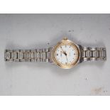 A lady's Tissot stainless steel bracelet watch with white enamel dial