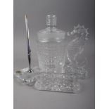 A Waterford cut glass biscuit barrel (chip to cover), two Waterford glass model seahorses, larger