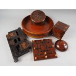 A turned mahogany fruit bowl, a thuya box and cover, two Indian carved hardwood boxes, a basket
