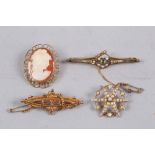 A Victorian 15ct gold bar brooch, set peridot and pearls, two 9ct gold brooches and a cameo brooch